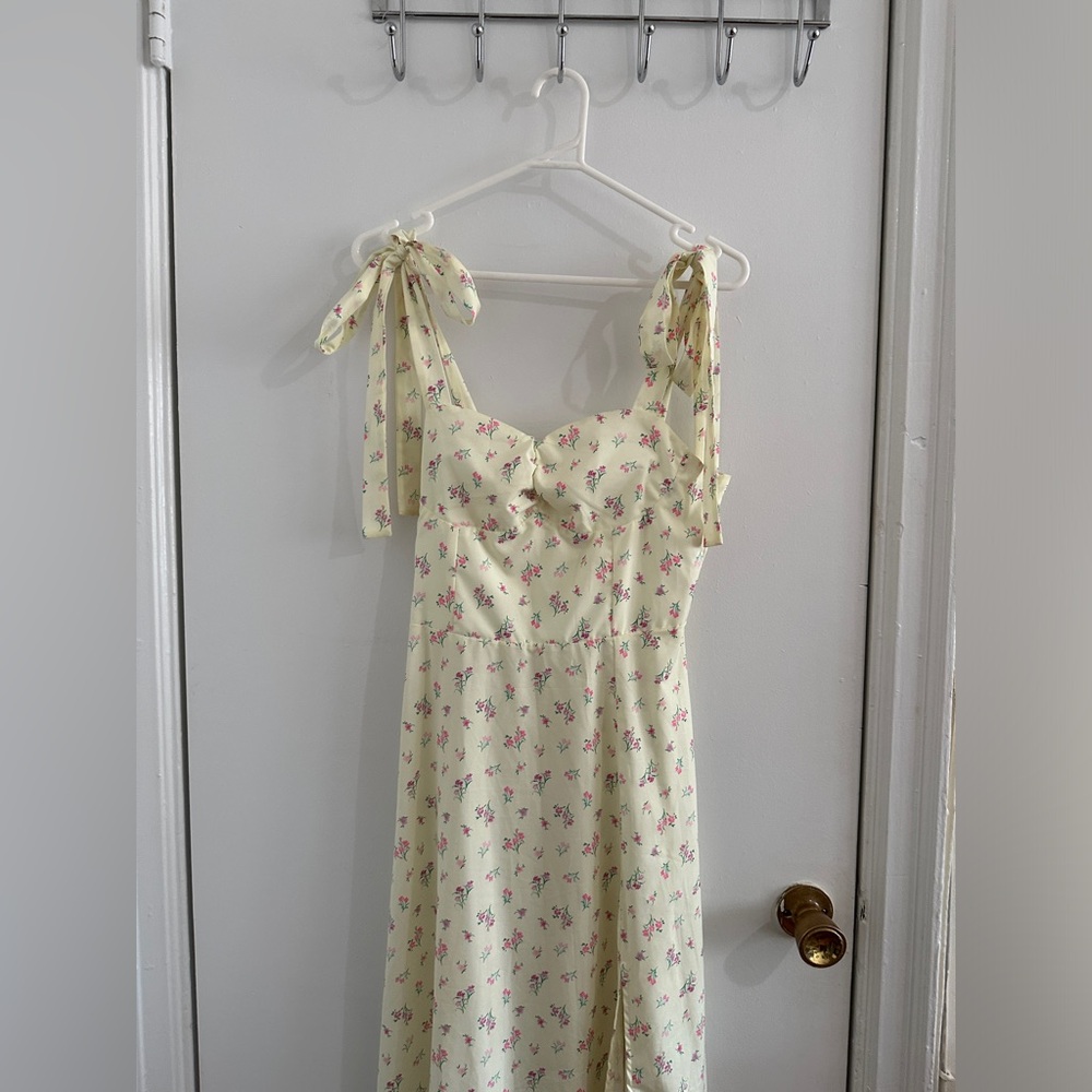 Floral dress with thigh slit & bow tie strap detail
